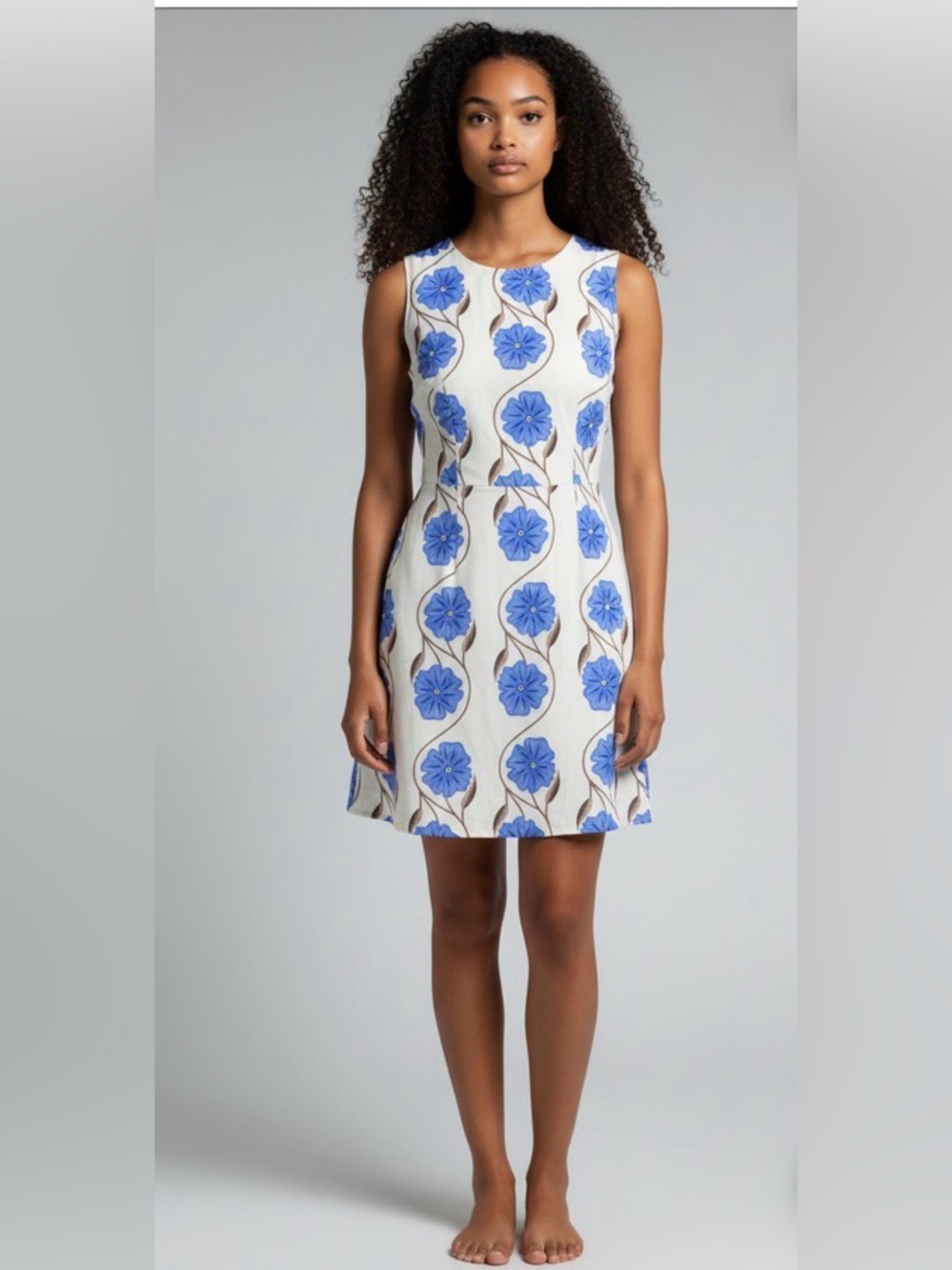 Floral light blue and tan sleeveless dress with pockets